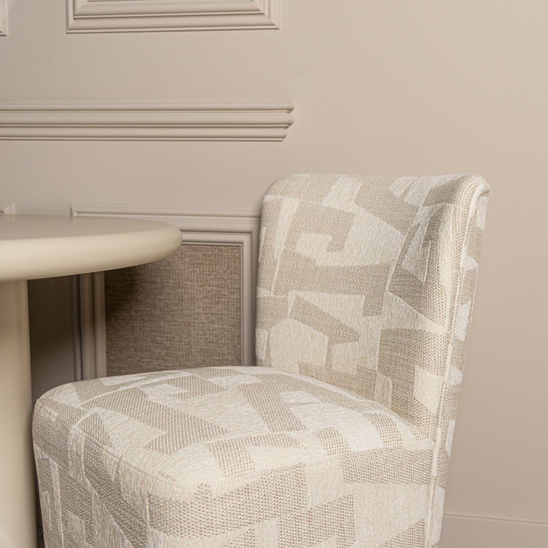 Dining room chair Lorain beige graffiti on wheels
