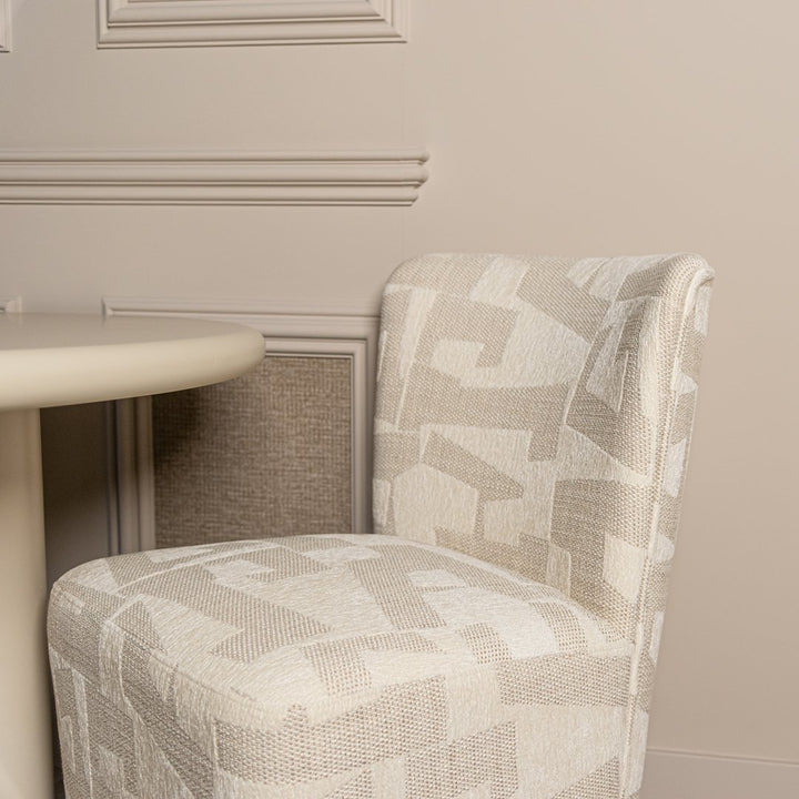 Dining room chair Lorain beige graffiti on wheels