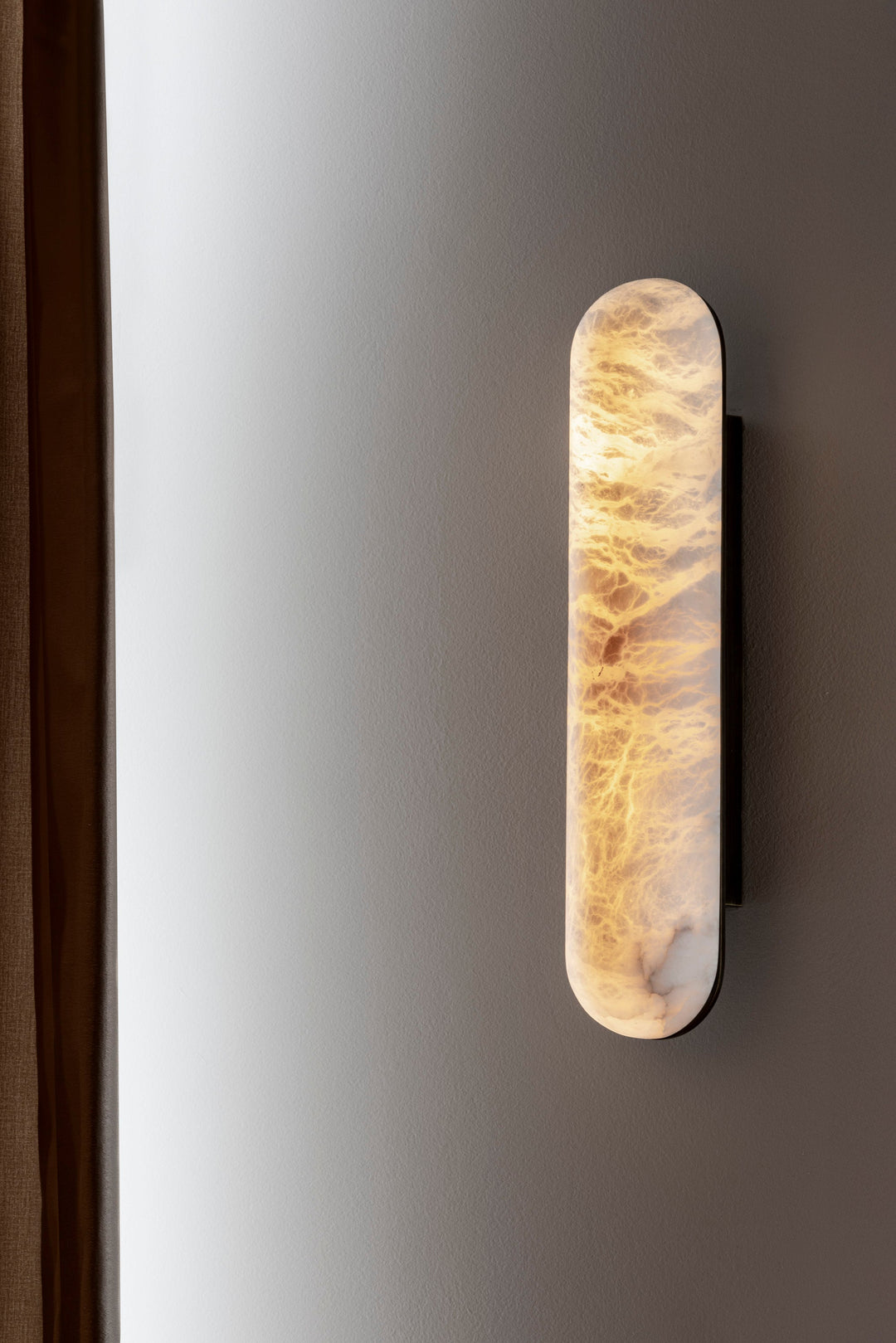 Wandlamp Castello in een interieur