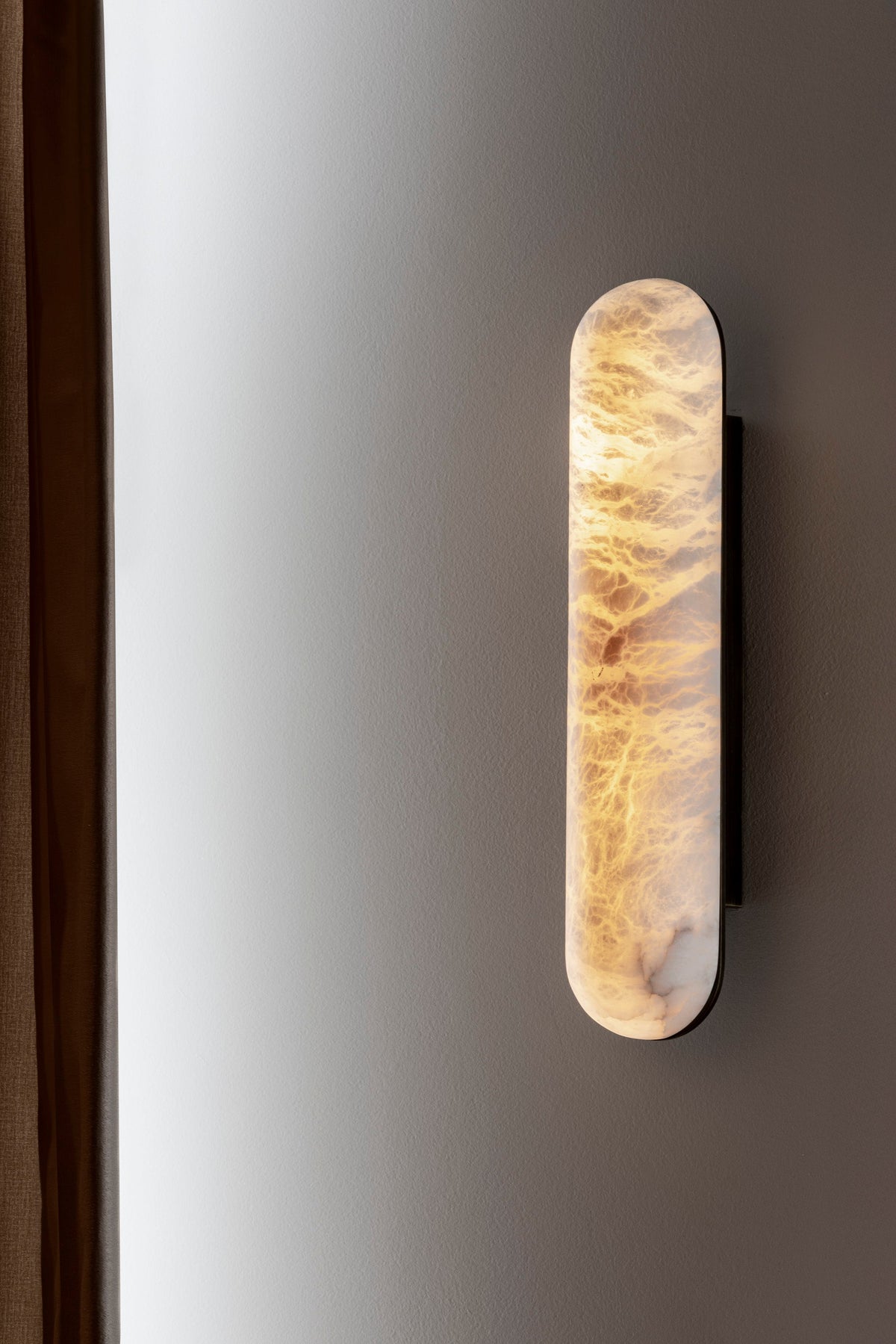Wandlamp Castello in een interieur